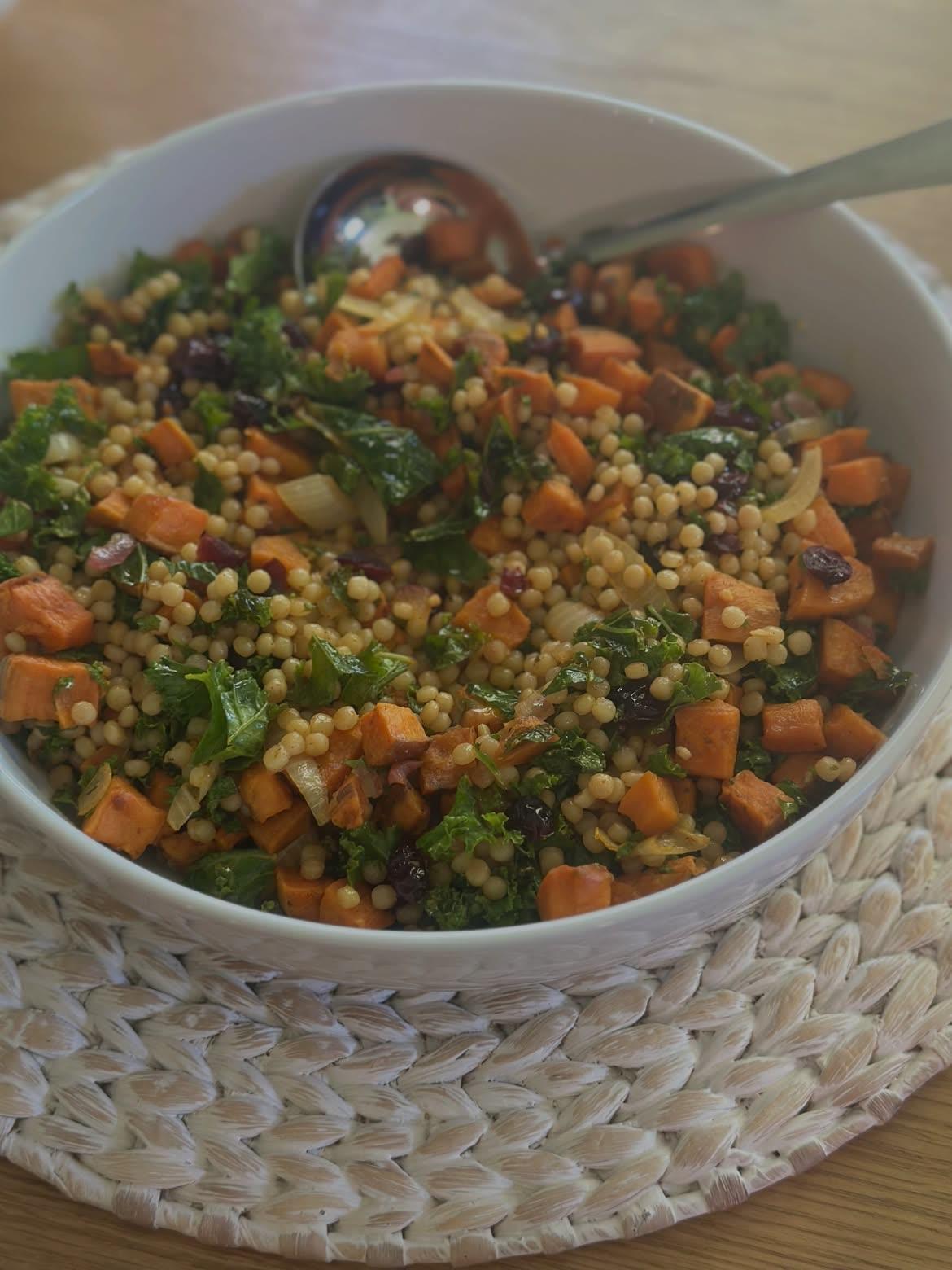 Pearl couscous salad with roasted sweet potato, kale and dried cranberries
